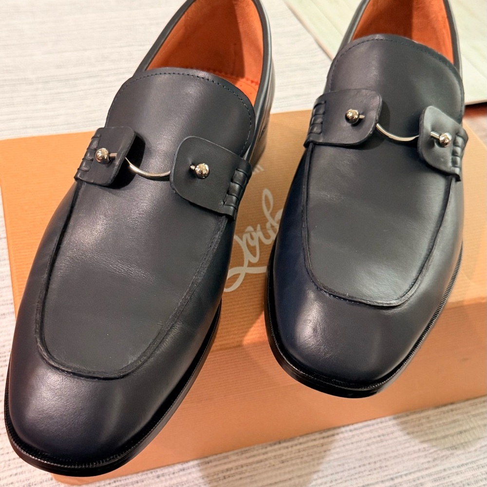 Christian Louboutin Dark Leather Slip-Ons with Metal Detail